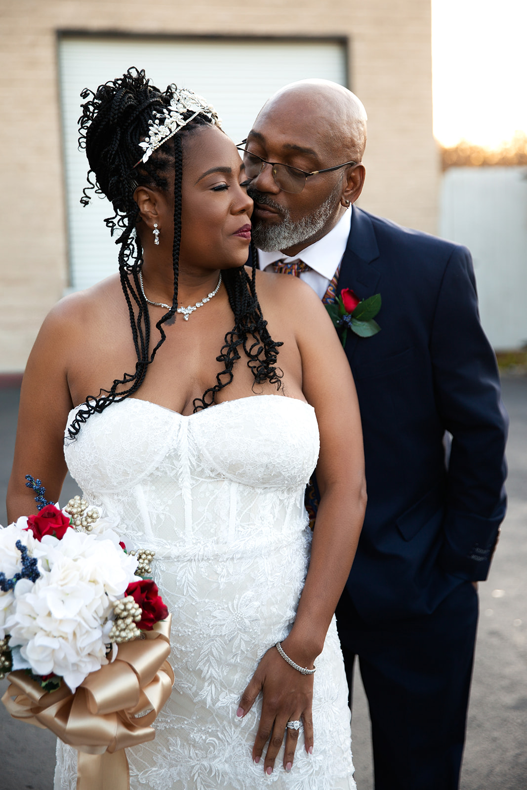 Bride and groom kiss after wedding ceremony.